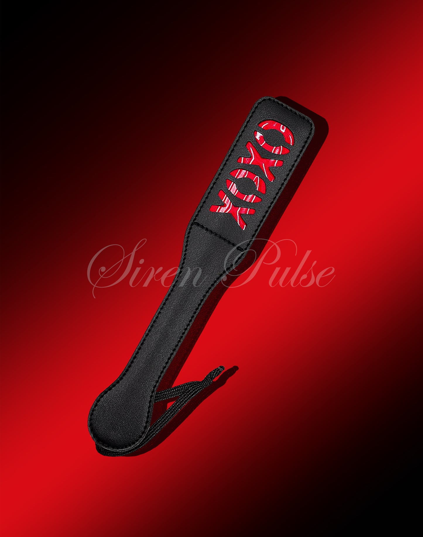 Siren Pulse spanking paddle crafted for impact play and BDSM sessions. Ideal for exploring spanking paddle techniques, BDSM cane styles, and BDSM sex stories.